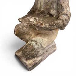 Two composition stone garden figures, comprising a seated boy figure and a standing classical draped female figure, each on square base, weathered painted finish.