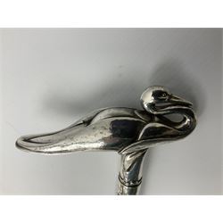 Art Deco style Italian 'Rivestito' covered silver walking stick handle, modelled in the form of a swan, stamped 'R', upon a silver collar hallmarked Birmingham 1986, makers mark DH-L, and hardwood shaft, L96cm

Provenance by vendor repute: 
This walking cane comes from a private collection amassed by the current vendors mother who was an Antique dealer specialising in walking sticks, working at the Portobello Road Antique Market in London for over forty years. 
In 1988 the prop crew from LWT (now ITV) visited Portobello Road looking for, amongst other items, a signature stick for David Suchet to use in his portrayal of Agatha Christie's Poirot. 
At the time this particular walking stick was one of five in possession. The prop crew chose and purchased another of the five which was then used by Suchet throughout all seventy episodes of the much loved series. 
Following the conclusion of the series Suchet was gifted his particular cane, which has been loaned to and can now be seen at the Agatha Christie Gallery at the Torquay Museum. 
