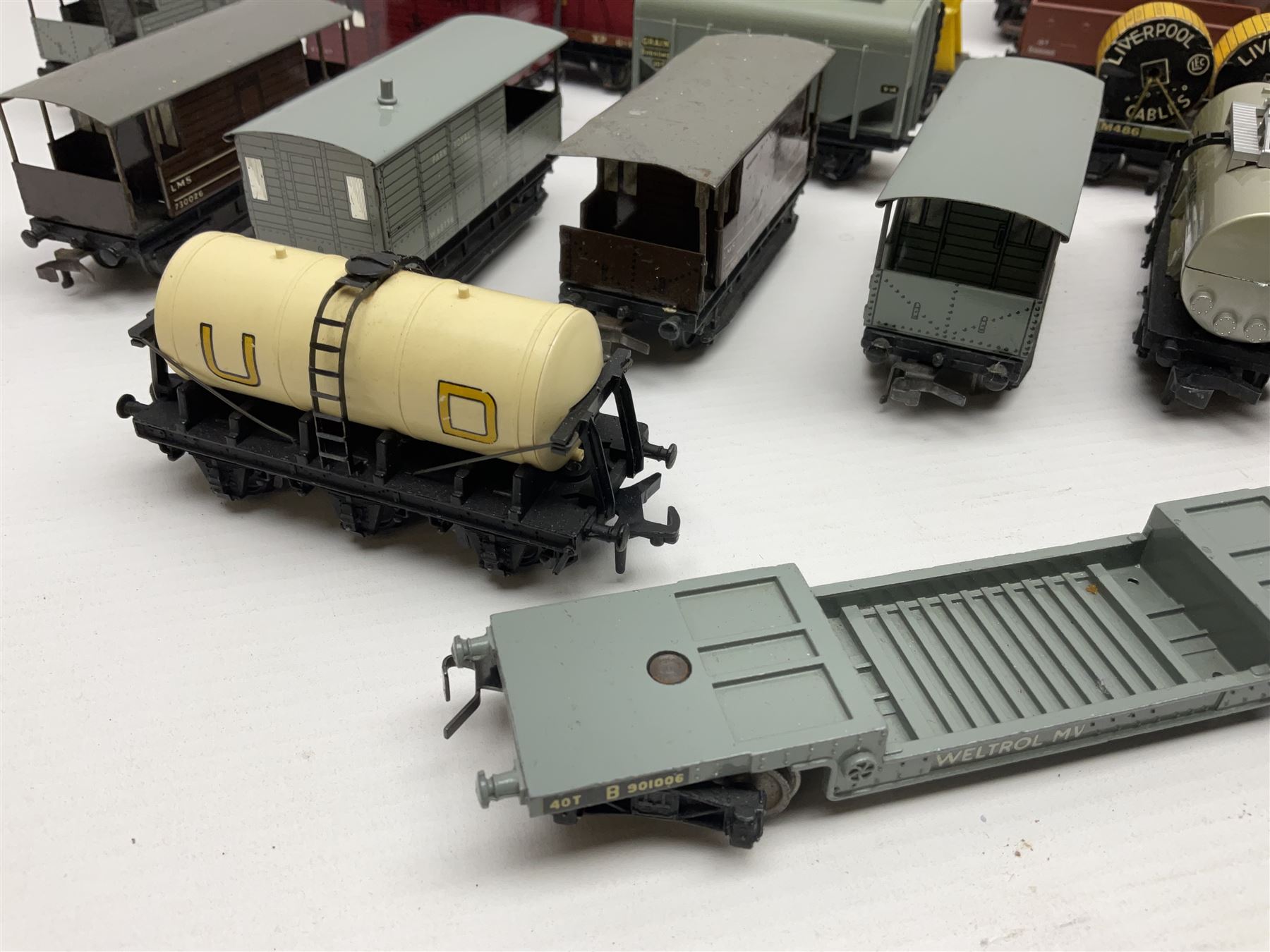 Hornby Dublo - forty-three goods wagons including nine tank wagons (Esso, Mobil, Vacuum, UD and Traffic Services), brake vans, meat and fish wagons, bogie well and bolsters, cable drums, open wagons, salt and grain wagons, etc; and six others by Tri-ang etc; all unboxed (49)