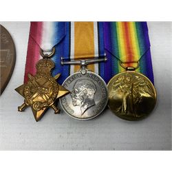 WW1 KIA group of three medals comprising British War Medal, 1914-15 Star and Victory Medal together with bronze Memorial Plaque named to G-13 Pte. F.G. Hodges R. Suss. R.; with ribbons; displayed on modern board for wearing; some biographical details