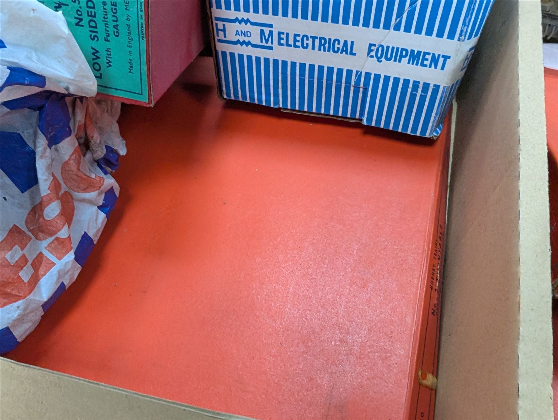 Hornby 'O' gauge 42380 No.2 Turntable, 43063 Points and 42320 No. 1 Level Crossing, all boxed, together with two tin plate passenger coaches, Hornby 'O' gauge LMS tender, three plastic 'O' gauge wagons, Hornby mechanisms, HM Duette Transformer Controller and other accessories