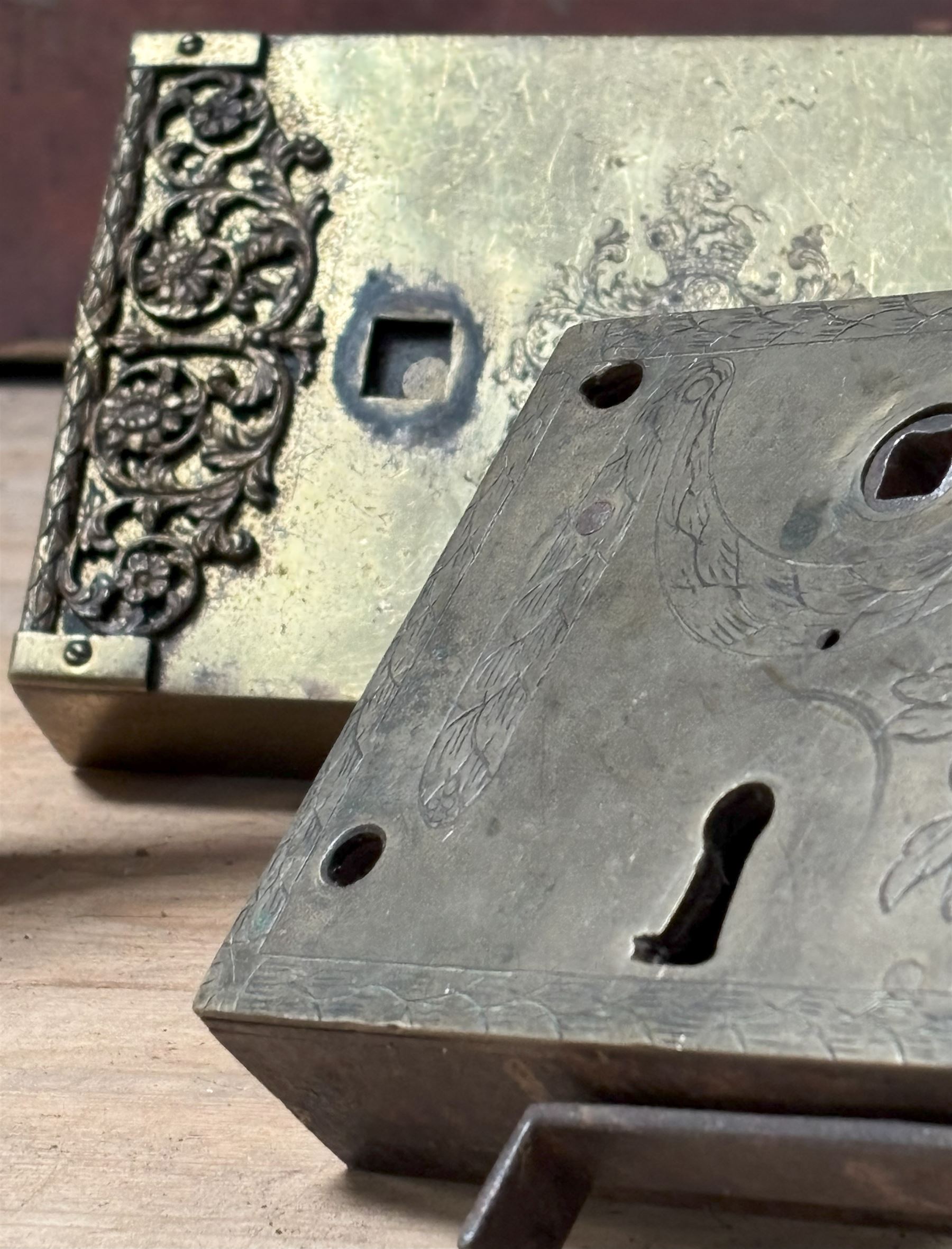 Large 19th century brass dead lock with key (16cm x 11cm) together with a gilt brass cased dead lock, the case with engraved cartouche and filigree, complete with key (18cm x 11cm) together with another engraved brass cased door lock (3)  - COLLECTION BY APPOINTMENT FROM: The White House, Thirsk Road, Easingwold, York, YO61 3NF - CALL 01723 507111 TO ARRANGE