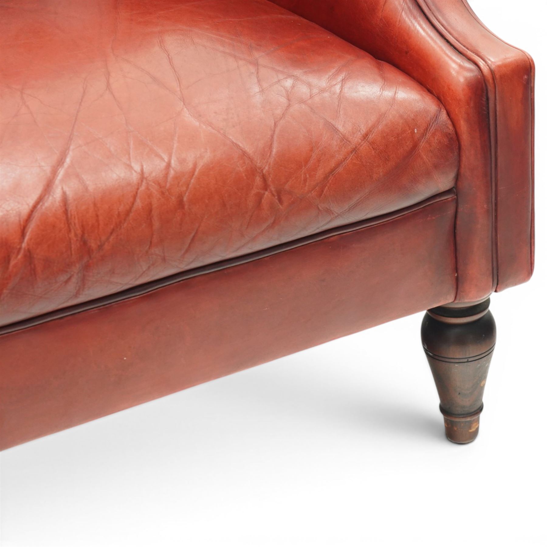 Laura Ashely - Georgian design Chesterfield style armchair, upholstered in back-buttoned crimson leather, on turned front supports