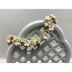 Lladro figure, Garden of Dreams, modelled as a woman reclining in front of trellis of flowers on a mahogany base, limited edition 3129/4000, sculpted by  José Puche, with original box, no 7634, year issued 1994, year retired 1996, H32cm