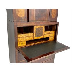 Early to mid-19th century figured mahogany Continental secrétaire à abattant, stepped top fitted with single cupboard, inlaid with oval figured amboyna panels, the fall front inlaid with shell motif enclosing a satinwood interior fitted with cupboard, drawers, and pigeon holes, three long drawers below, on square tapering feet