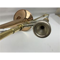 Sebastian Bucklet Aquae Sulis copper and brass trombone No.0910004; in lightweight carrying case; and Kinsman folding tubular chrome music stand in case (2)