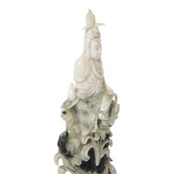 Chinese carved hardstone figure of Guanyin on wooden base, H31cm