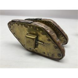 Trench Art - WWI 0-8-0 steam locomotive made from brass, copper and late Victorian pennies and half-pennies L17.5cm; WWI brass and copper tank candleholder; WWI brass shell case two-handled vase inscribed 'RFA France 1914-17'; and an unrelated brass plant holder (4)