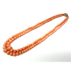 19th/early 20th century graduating double strand coral bead necklace, with rose gold clasp engraved with initials MJM