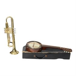 Slade USA trumpet and a banjolin, both cased