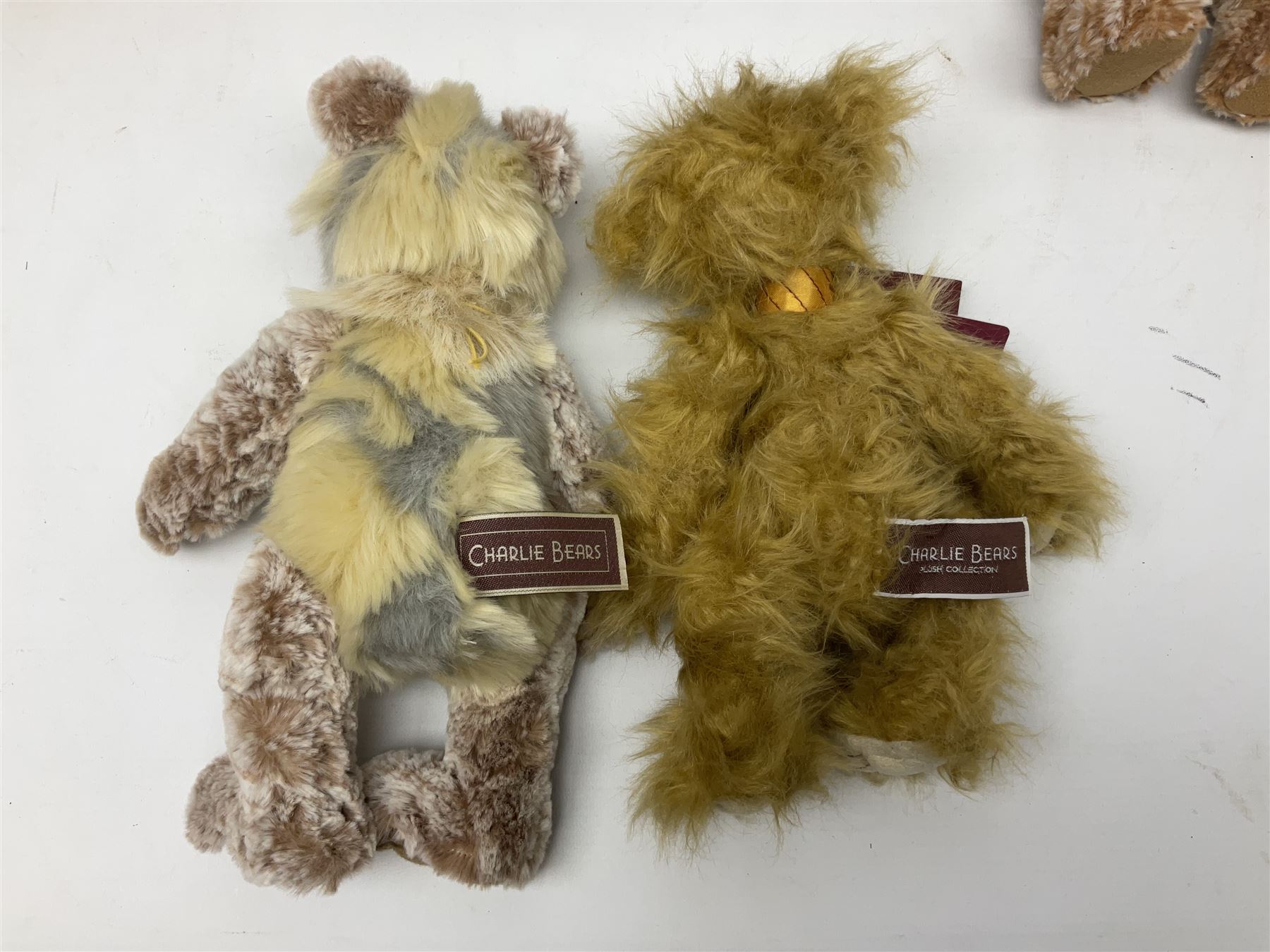 Seven Charlie Bears, comprising limited edition Anniversary Cheesecake SJ5471, designed by Isabelle lee, 431/500, Nuala CB185169, Liddy CB161648A, Philomena CB151592, and AJ CB171784B, each designed by Isabelle Lee, plus Shenanigans CB205243O, and another example lacking tag 