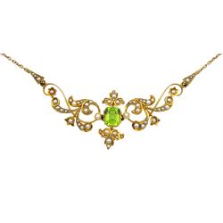 Edwardian peridot and split pearl necklace, central emerald cut peridot with open work foliate design split pearl surround, on trace link chain, stamped 15ct