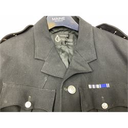 LNER Police cape; indistinctly dated 1943(?); York & North East Yorkshire Police belted tunic; belted tunic with Chief Constable epaulettes and buttons; and another tunic with staybrite Queens Crown buttons (4)