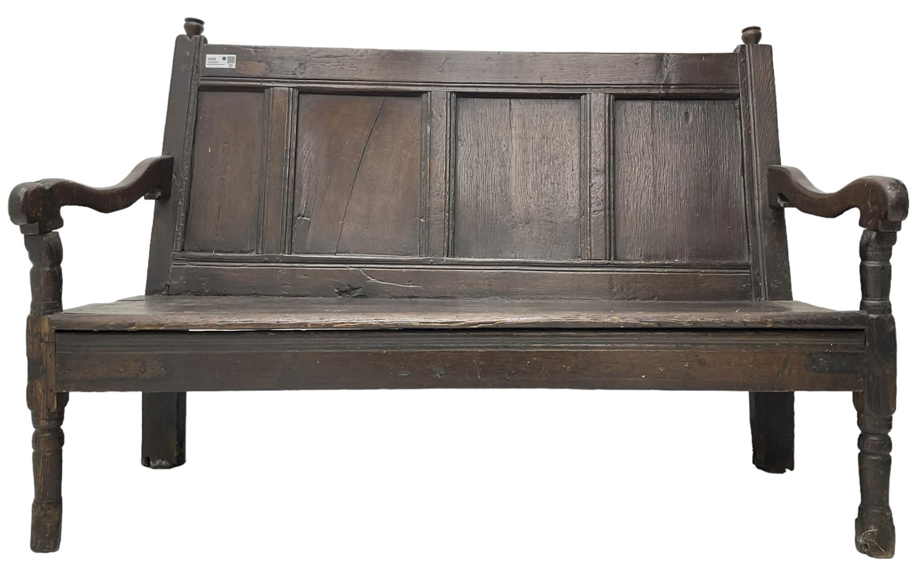 18th century oak hall bench or settle, quadruple panelled back with moulded rails, over a solid seat, raised on front turned supports