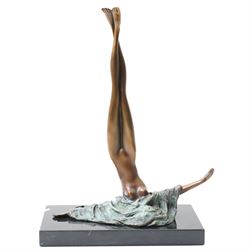 Bronze figure of a female with legs raised and outstretched arms, signed J Patoue, upon re...