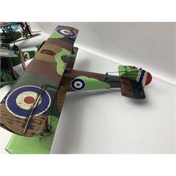 Three large painted tin-plate models of bi-planes, wingspan 32cm; and five Corgi Aviation Archive die-cast models of bi-planes on stands; all unboxed (8)