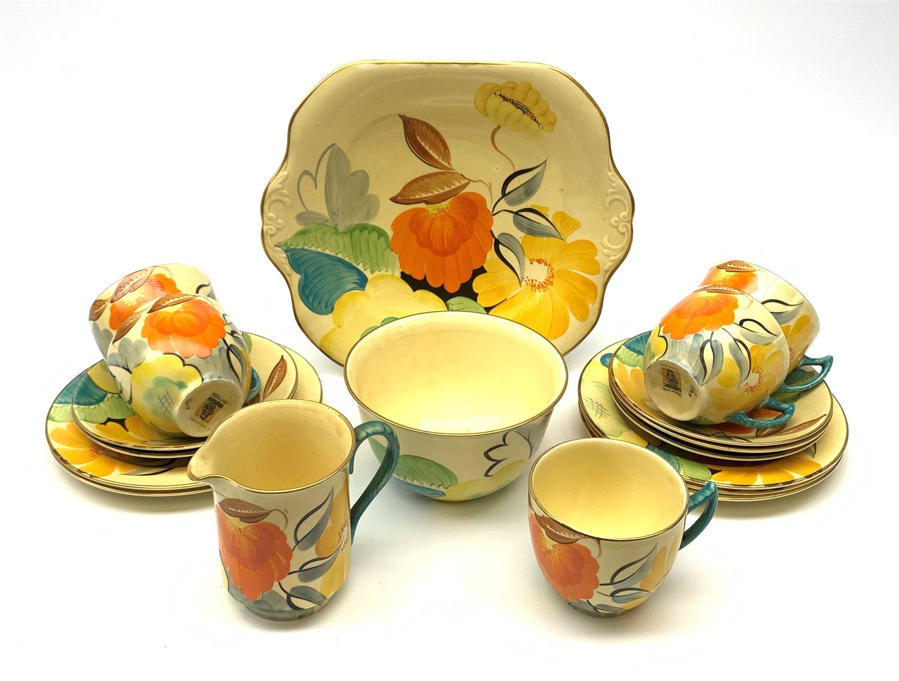 A Grays Pottery tea set, hand painted with flowers in tones of orange