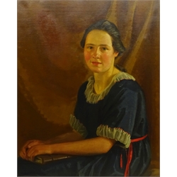 James P Barraclough (British 1891-1942): Half Length Portrait of a Young Woman in a Blue Dress, oil on canvas signed 75cm x 62cm 
Provenance: by direct descent through the artist's family