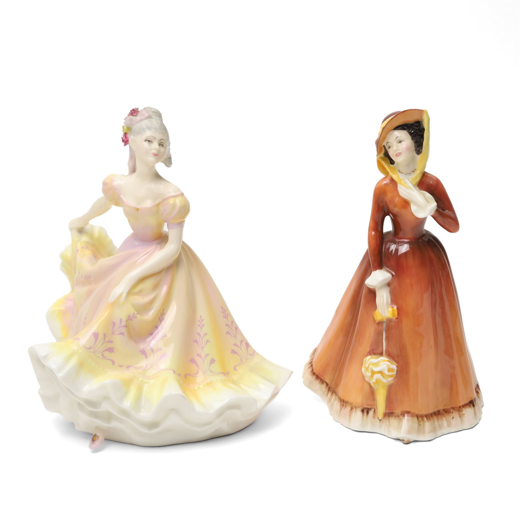 Royal Doulton figures comprising The Professor HN2281, The Judge HN2443, Julia HN2705, Fleur HN2368, Sandra HN2275, Ninette HN2379 and an English Setter with pheasant HN2529 (7)