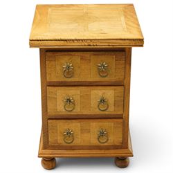 Barker & Stonehouse - pair of contemporary flagstone and mango wood bedside chests, the rectangular inlaid top over three drawers with metal ring handles, on compressed bun feet