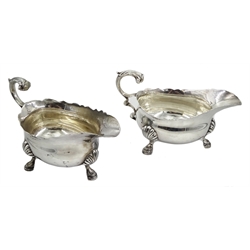  Pair of silver sauce boats,double C scroll handle on three hoof feet by Z Barraclough & Sons, London 1926/7, approx 23oz  Notes: By direct decent from Barraclough family  