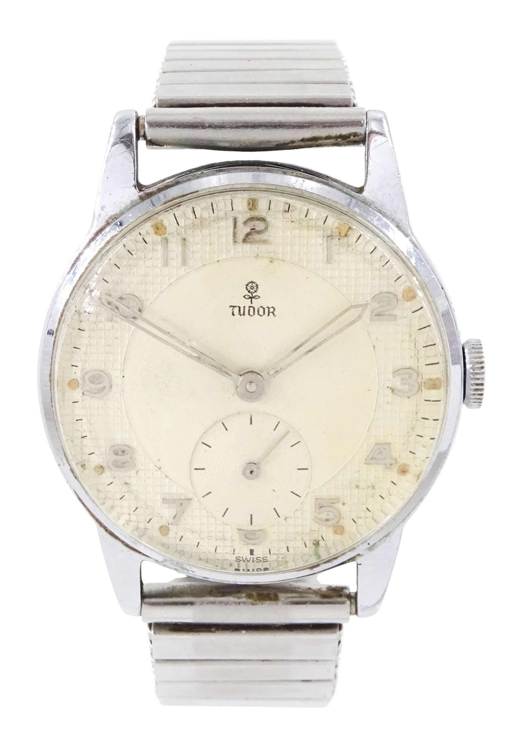 Tudor gentleman's stainless steel manual wind wristwatch, circa 1950's, Ref. 12856, silvered textured dial with Arabic hour markers and subsidiary seconds hands, back case signed Dennison for Rolex and numbered 12856 6545, on expanding stainless steel strap
