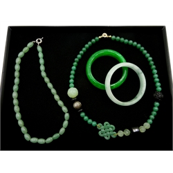 Two jade bangles, jade and cinabar necklace and a celadon jade necklace