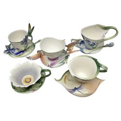 Five Franz teacups and saucers comprising Hummingbird FZ00129, Bluebell FZ00875, Dragonfly FZ00028, Butterfly XP1693 and Daisy FZ00793, together with Hummingbird spoon, all boxed (6)
