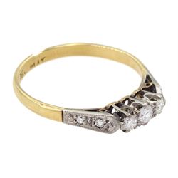 Gold three stone diamond ring, with diamond set shoulders, stamped 18ct Plat 