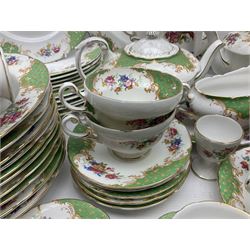 Paragon Rockingham pattern part tea and dinner service including three teapots, milk jug, cups and saucers of various sizes, ten soup bowls, ten side plates, ten dinner plates etc (96)