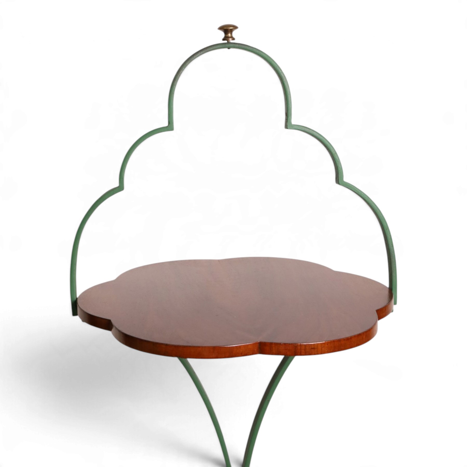 Art Deco stand, with scalloped wooden shelf, within green painted metal frame with scroll detail, upon a scalloped base, H75cm