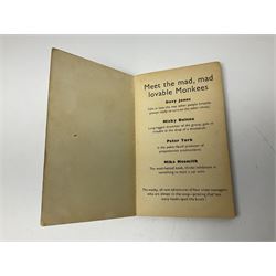 Monkees memorabilia - 'Monkees Monthly' magazine almost complete run from No.1 Feb 67 to No.31 Aug 69 (lacking nos.29 and 32); the cover of No.1 signed by all four members of the group during their 1997 Reunion Tour; quantity of A&BC bubble gum cards; programme for their only UK live performance in 1967 at Empire Pool Wembley; and other related late 1960s music magazines/paperback book