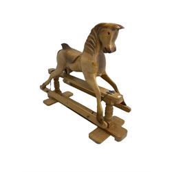 Terry White for White Horses (Hertfordshire 20th century) - Carved pine rocking horse, raised on a pine trestle base