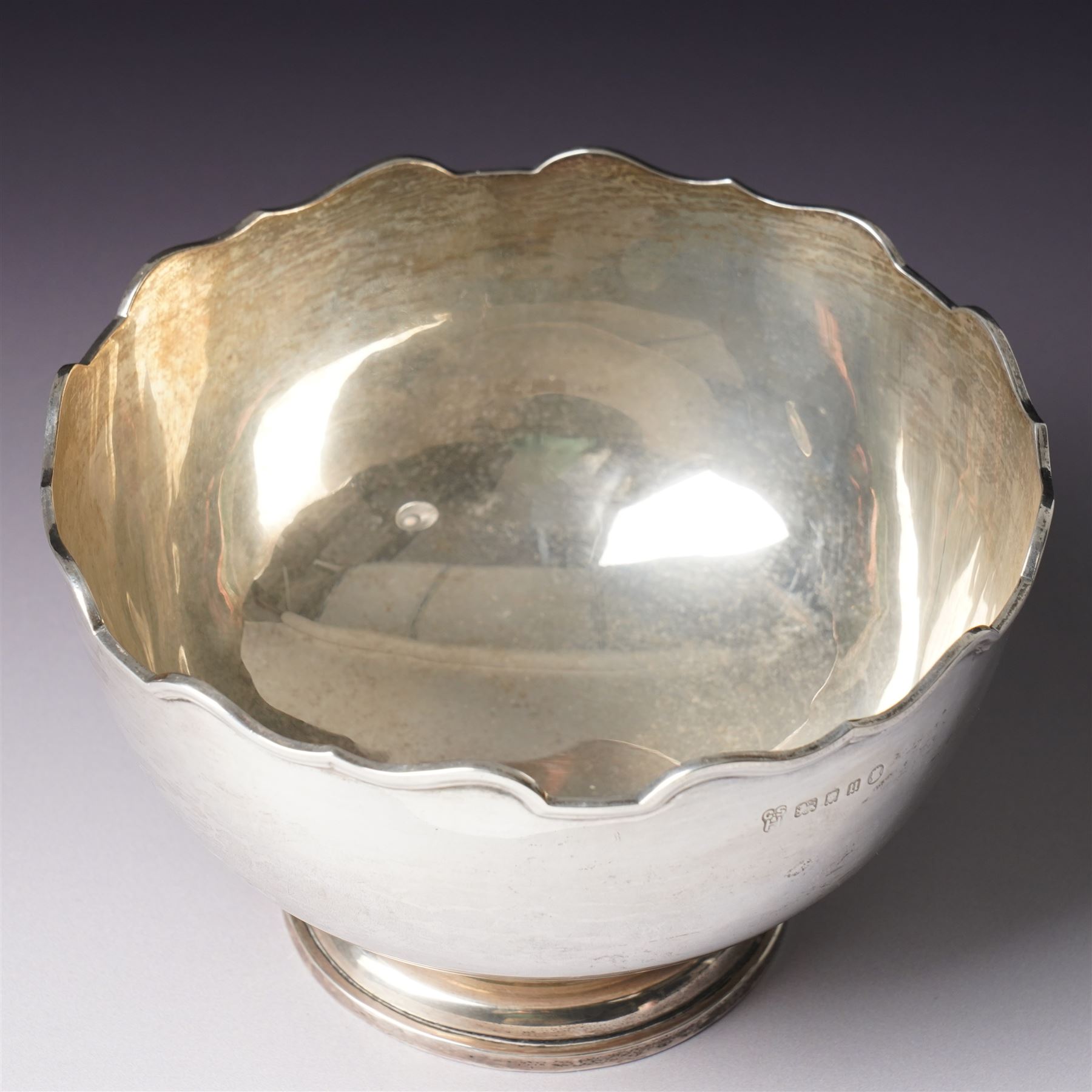 Silver circular bowl with crimped rim and short pedestal foot D14cm London 1935 Maker  C S Harris & Sons Ltd  
