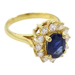 14ct gold oval sapphire and round brilliant cut diamond cluster ring, stamped 14K