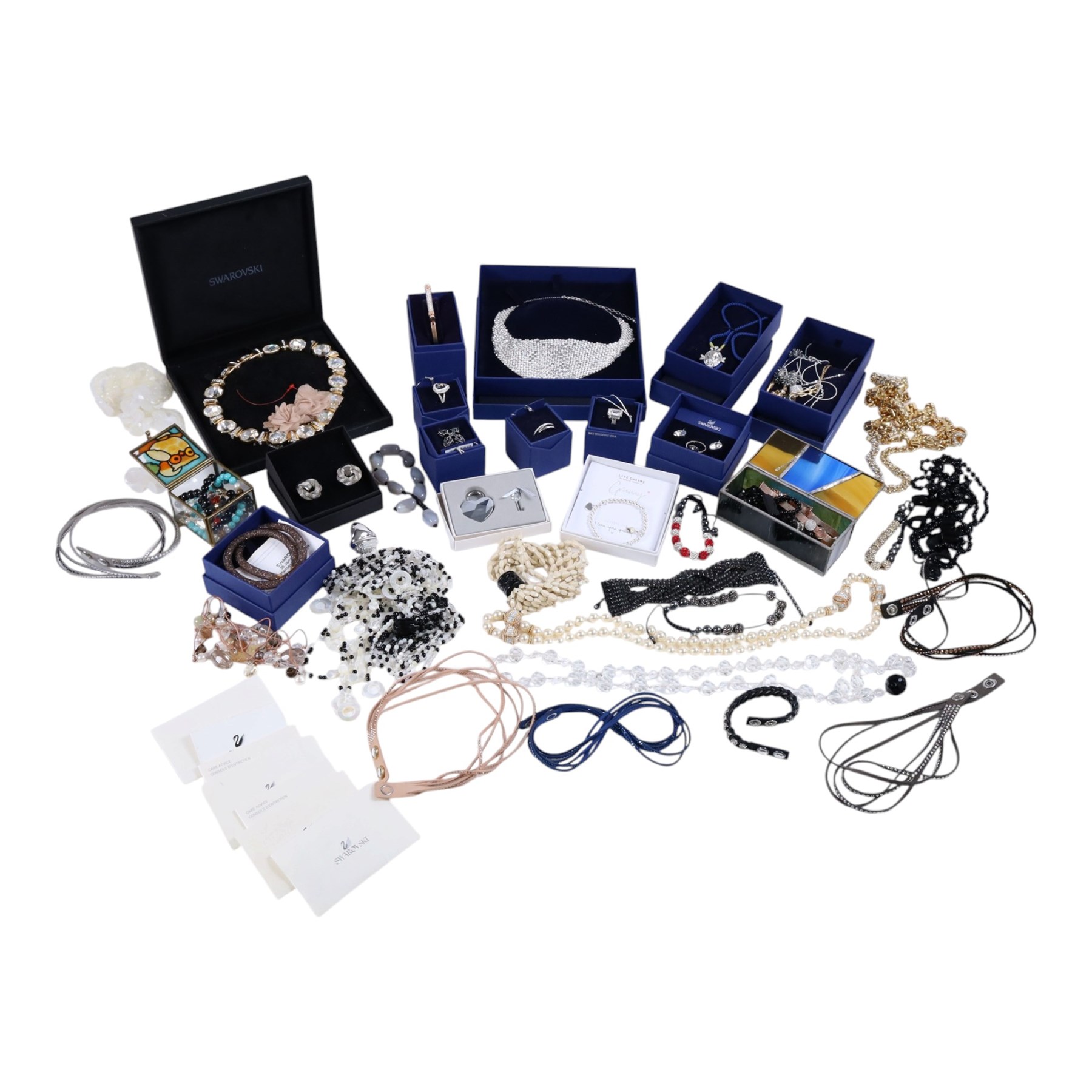 Collection of boxed Swarovski crystal jewellery, including statement necklaces, rings, bracelets and earrings, and a collection of costume jewellery including beaded necklaces