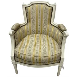 Late Victorian painted armchair, moulded frame, upholstered in striped fabric decorated with urns and floral motifs, on turned and fluted supports