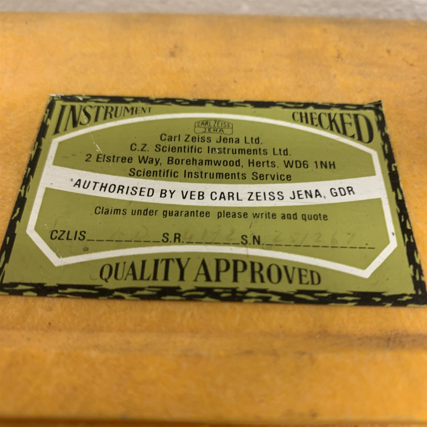 Carl Zeiss Theo 015B orange painted theodolite serial no.251267 in fitted case with accessories; E.R. Watts & Sons London level with black crackled body, serial no.1888, in calf leather carrying case; wooden folding tripod and telescopic measuring staff (4)