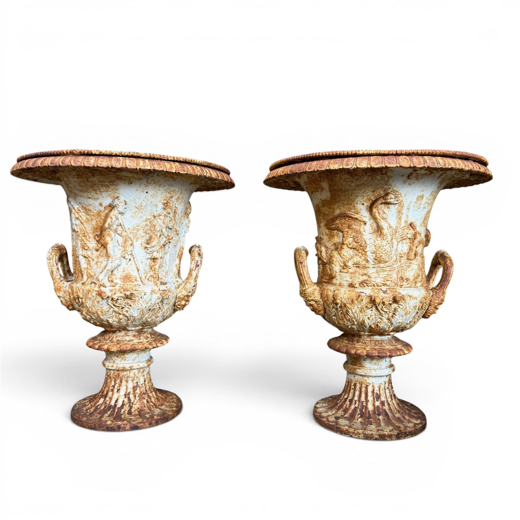 Andrew Handyside - pair of 19th century best quality cast iron garden urns, individually detailed in relief Allegorical Figures and Helaldic Swans, campagna form with twin handles, detail under rim, raised on circular fluted base