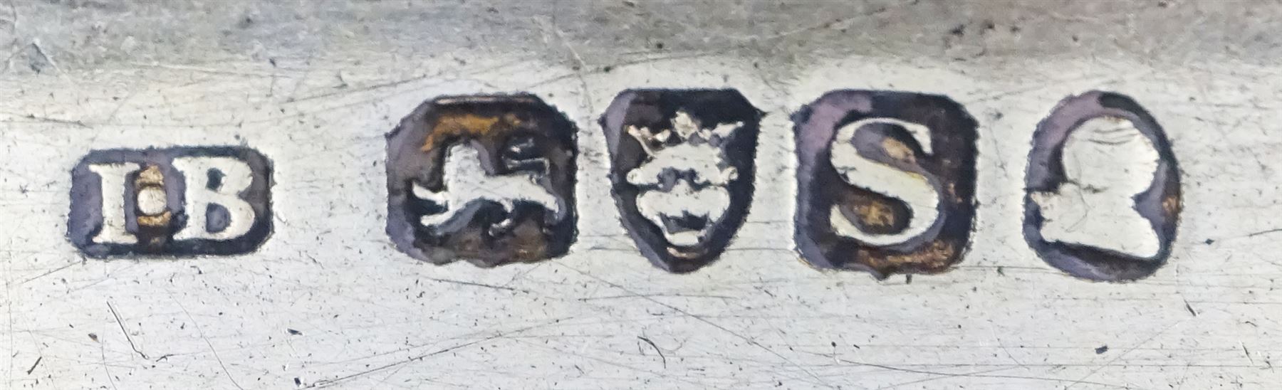 George III silver snuff box, of rectangular form with foliate engraved panel to hinged cover and underside of body, opening to reveal a gilt interior, hallmarked London 1813, makers mark I.B, W6.5cm, approximate 1.86 ozt (57.6 grams)