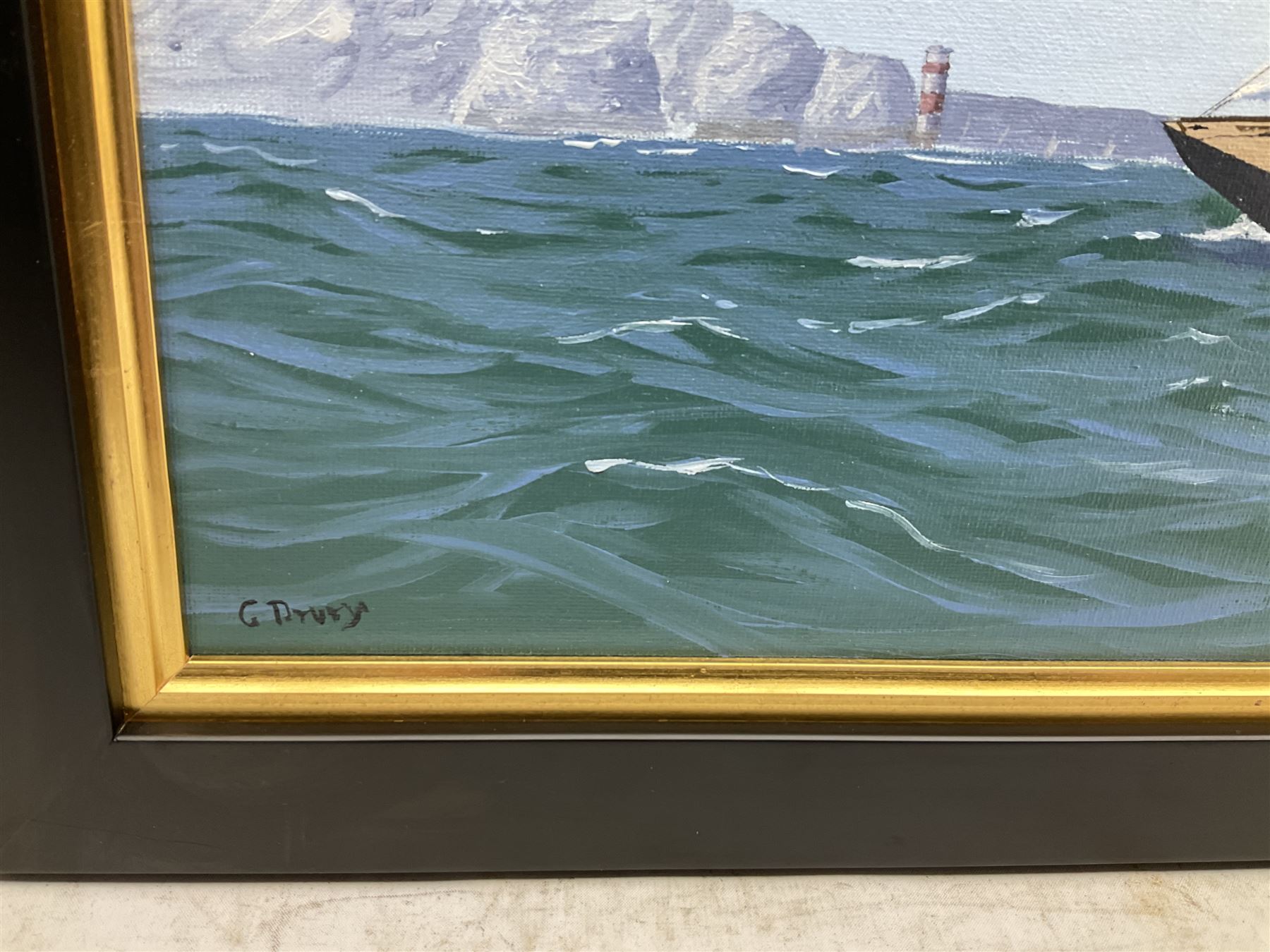 George Drury (British 1950-): J Class Racing Yachts - 'Velsheda and Endeavour off the Needles',  oil on board signed, titled verso 47cm x 73cm