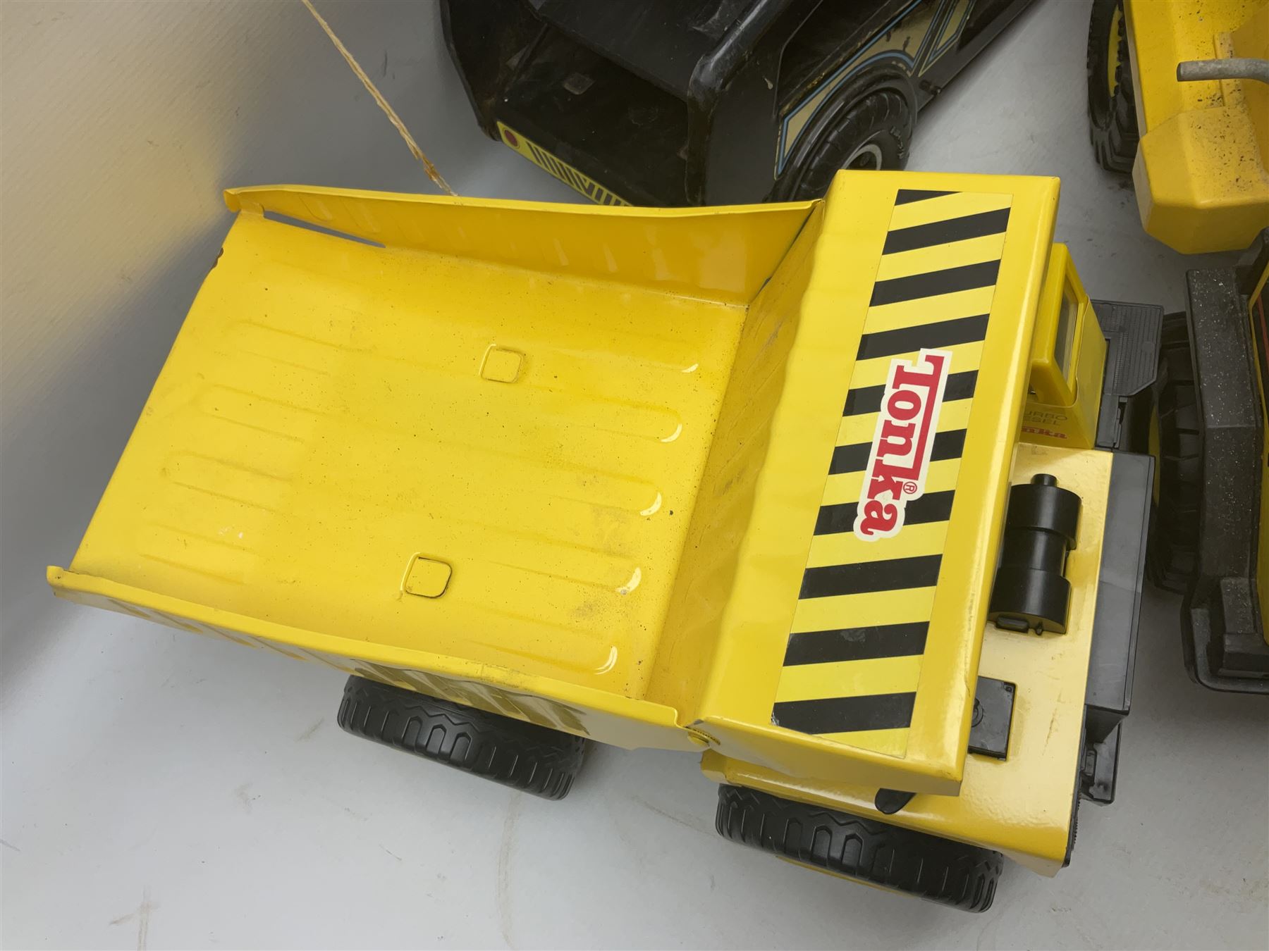 Tonka - five large scale steel pressed vehicles comprising Cement Mixer, Car Transporter, Mobile Crane and two Dumper Trucks (5)