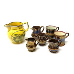 An early 19th century Staffordshire yellow ground jug, printed with two oval scenes of a country house, further detailed with silver lustre, H11cm, together with a group of 19th century copper lustre, comprising four jugs and two coffee cans. 