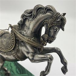 Modern silver model of a rearing horse, with ornate parcel gilt saddle and bridle, mounted upon a rectangular base, decorated with malachite panels to each side and upon four gilt bun feet, horse stamped 925, overall H14.5cm