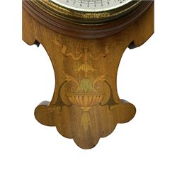 Edwardian art Nouveau aneroid barometer in a mahogany case inlaid with coloured satinwood scrollwork and motifs, with an open 8” porcelain dial displaying the silvered aneroid capsule and mechanism, with a brass recording hand and steel indicating hand recording barometric pressure from 26 to 32  inches, weather predictions in capitalised gothic script, within a flat glass and brass bezel, dial inscribed G F Smith & Co Scarborough” with a rectangular boxed mercury thermometer recording room temperature in degrees centigrade and Fahrenheit.