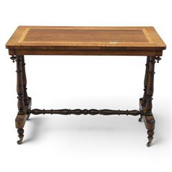 Victorian rosewood and beech stretcher table, rectangular walnut banded top, four turned legs and stretcher, raised on brass castors