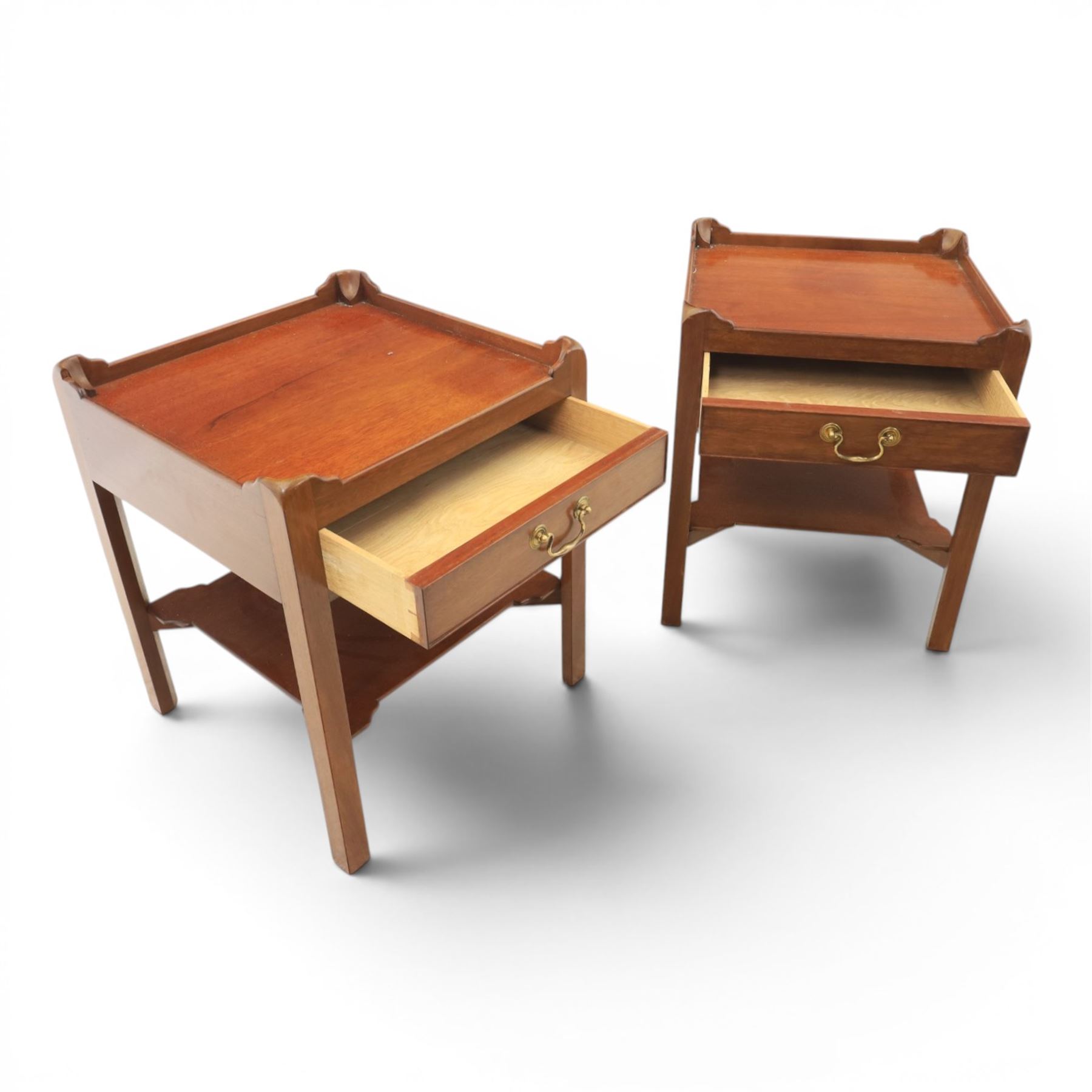 Georgian style pair of mahogany lamp tables, each with three-quarter gallery top above a single frieze drawer with brass swan neck handle, on square tapering supports united by an undertier