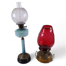 Victorian brass oil lamp with cranberry glass shade marked A L & Co, together with another...