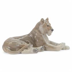 Royal Copenhagen recumbent lioness, no.804, with printed marks beneath H16cm