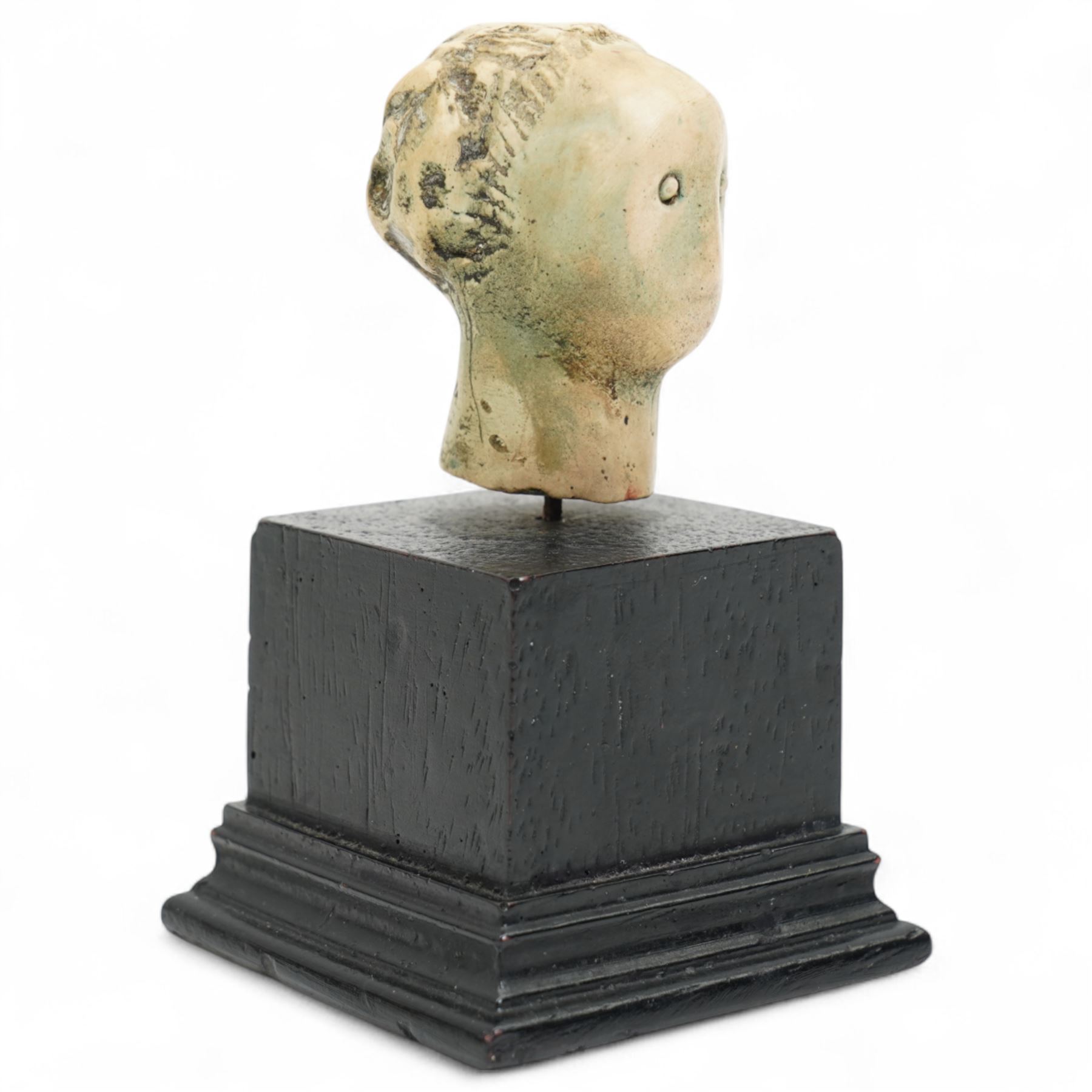 After Henry Moore (British 1898-1986): 'Head', plaster maquette sculpture, base marked with affixed catalogue label inscribed 'Head: 1957 Archive 0052852', W6.5cm H11cm